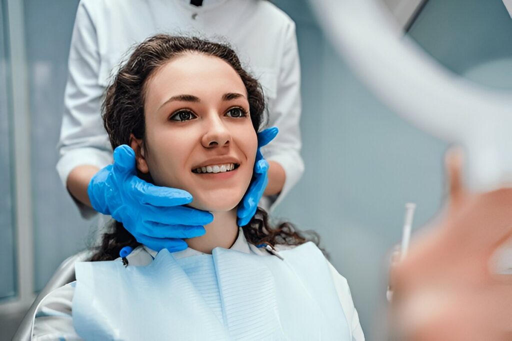 Smiling woman at Granada Dental receiving gentle dental care in Sherwood Park